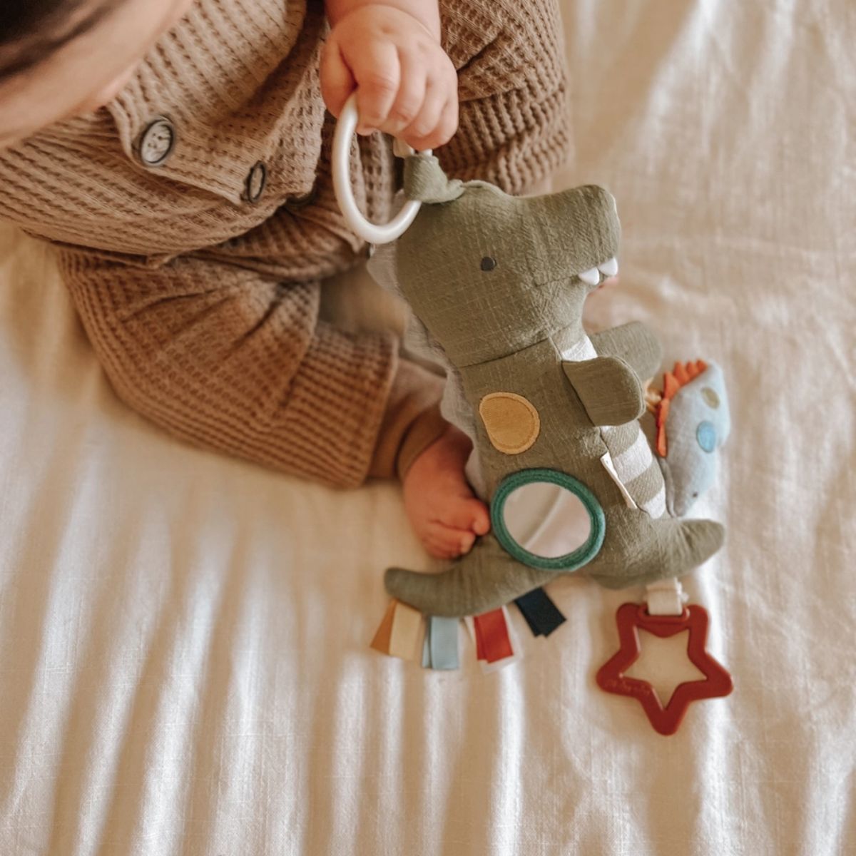 Itzy Ritzy Bitzy Traveler Developmental Sensory Toy - Dino