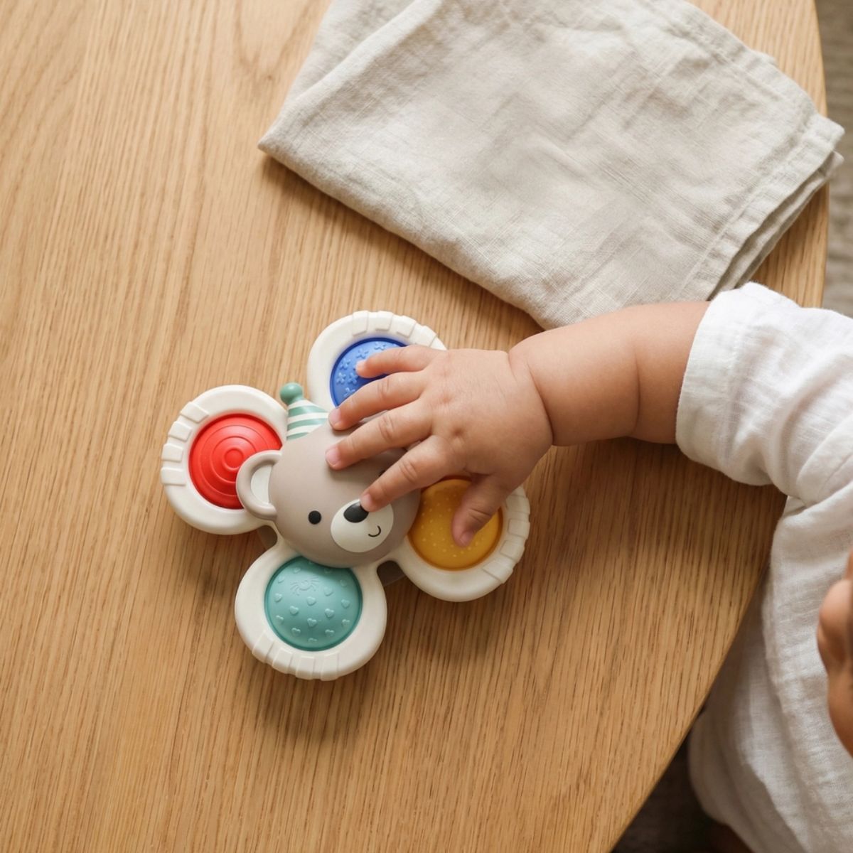 Itzy Ritzy Pop & Whirl Fidget Spinner Travel & Bath Toy - Circus on Luna Baby Store Miami
