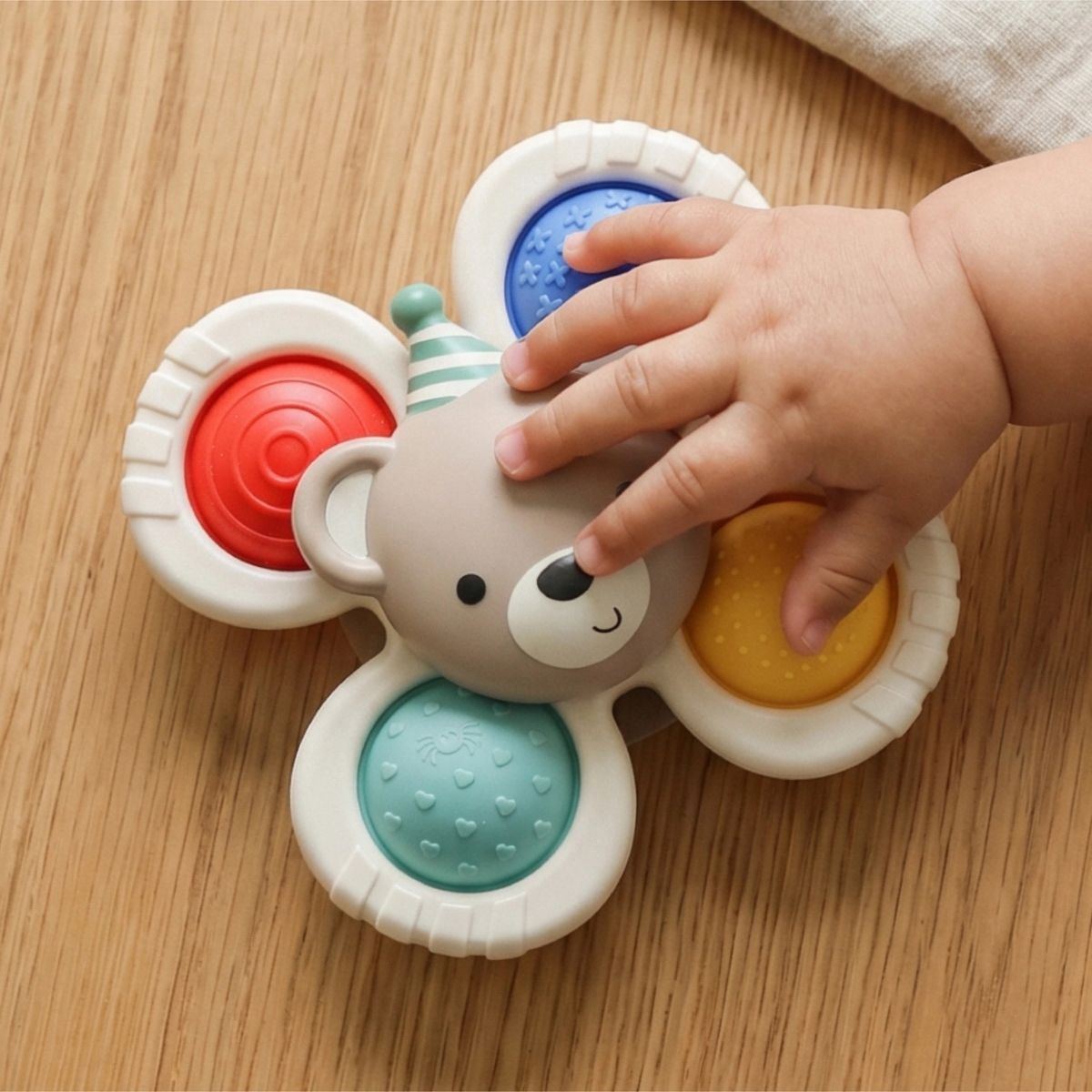 Itzy Ritzy Pop & Whirl Fidget Spinner Travel & Bath Toy - Circus on Luna Baby Store Miami
