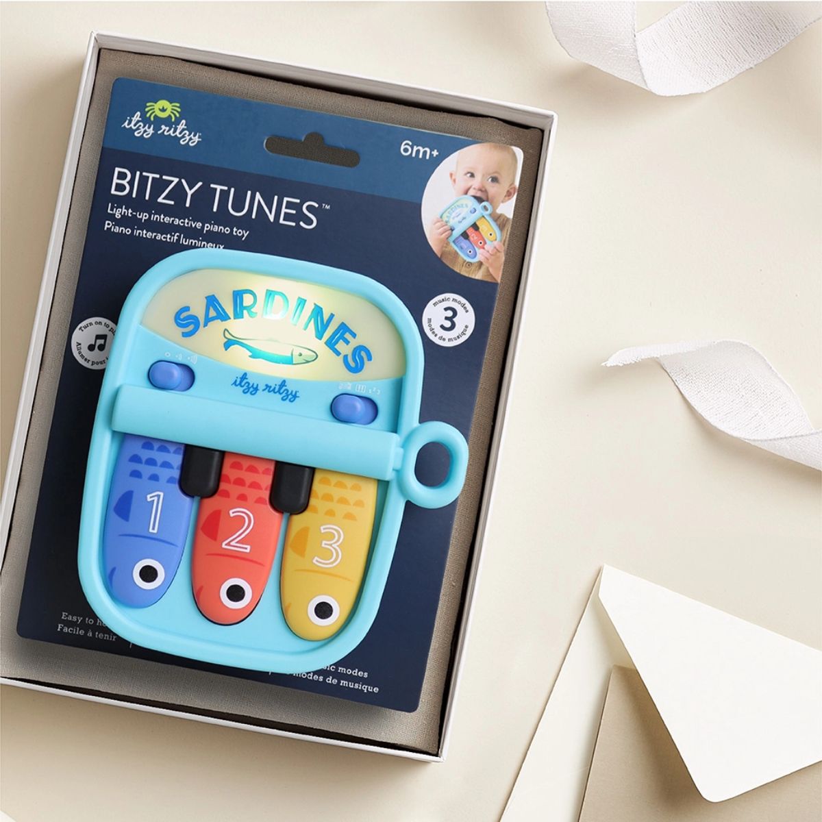 Itzy Ritzy Bitzy Tunes Sardines Baby Piano Toy on Luna Baby Store Miami