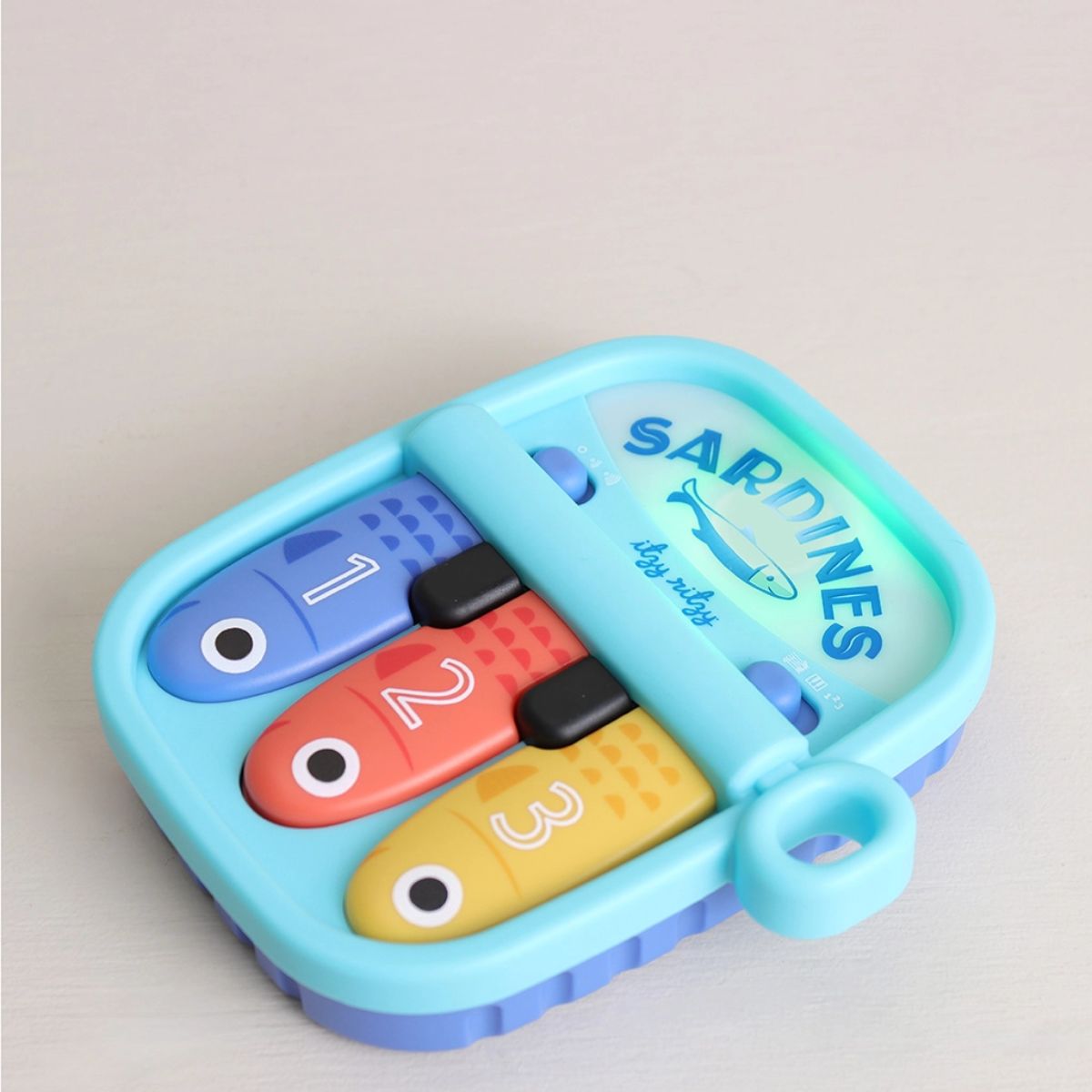 Itzy Ritzy Bitzy Tunes Sardines Baby Piano Toy on Luna Baby Store Miami