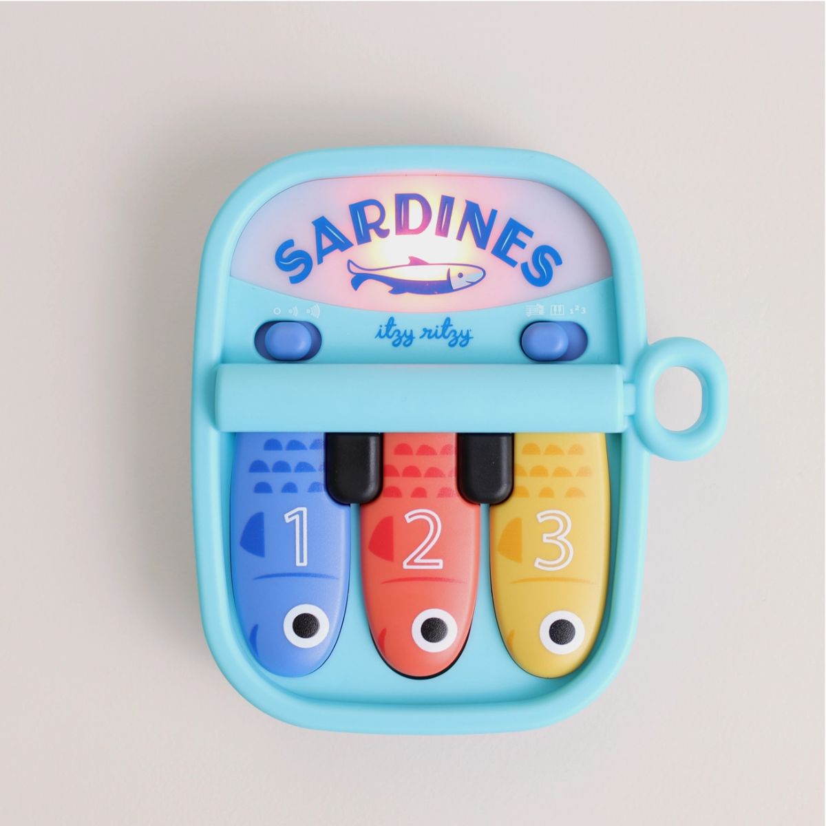 Itzy Ritzy Bitzy Tunes Sardines Baby Piano Toy on Luna Baby Store Miami