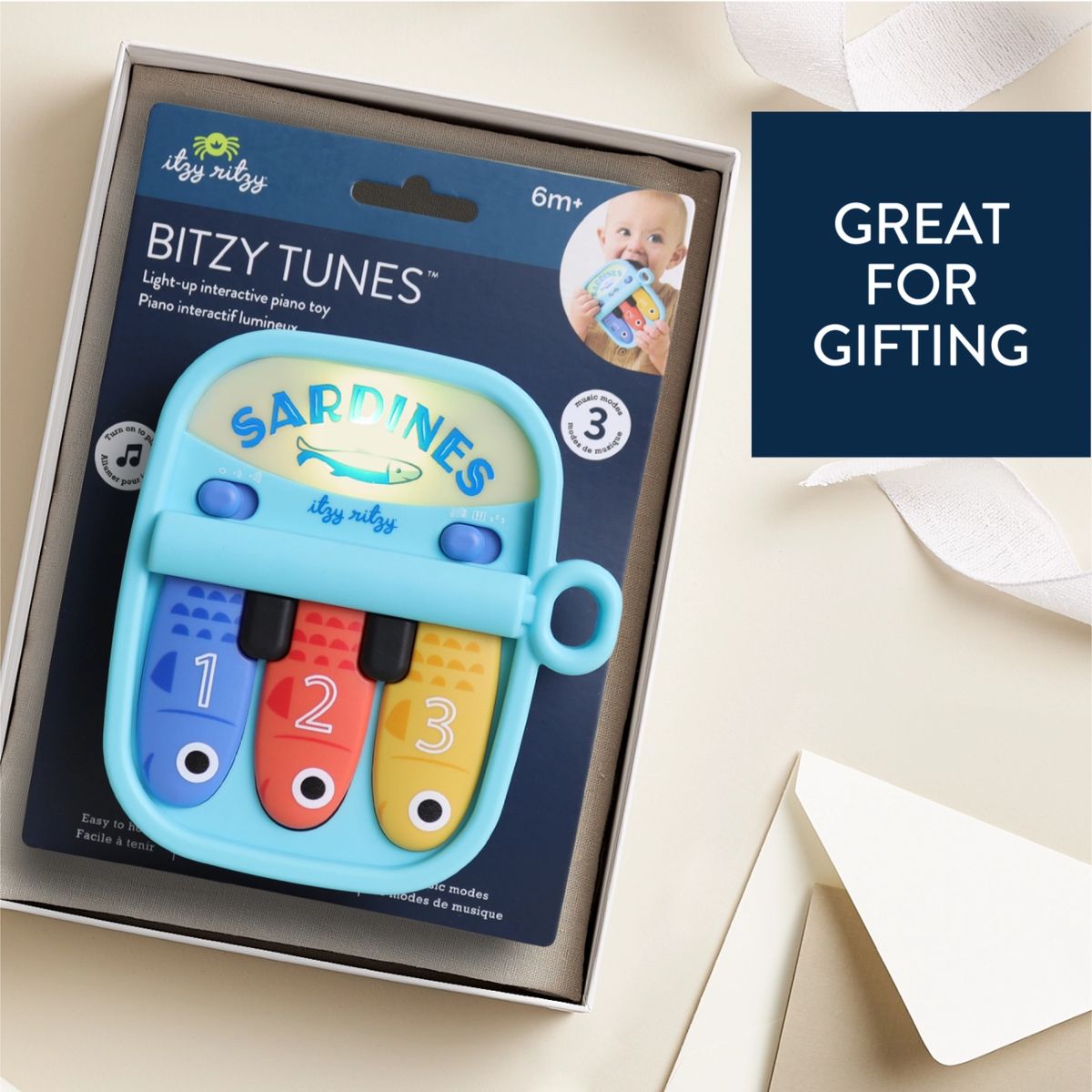 Itzy Ritzy Bitzy Tunes Sardines Baby Piano Toy on Luna Baby Store Miami