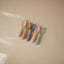 Mushie Silicone Toddler Starter Spoons 2-Pack Cambridge Blue/Shifting Sand on Luna Baby Store Miami