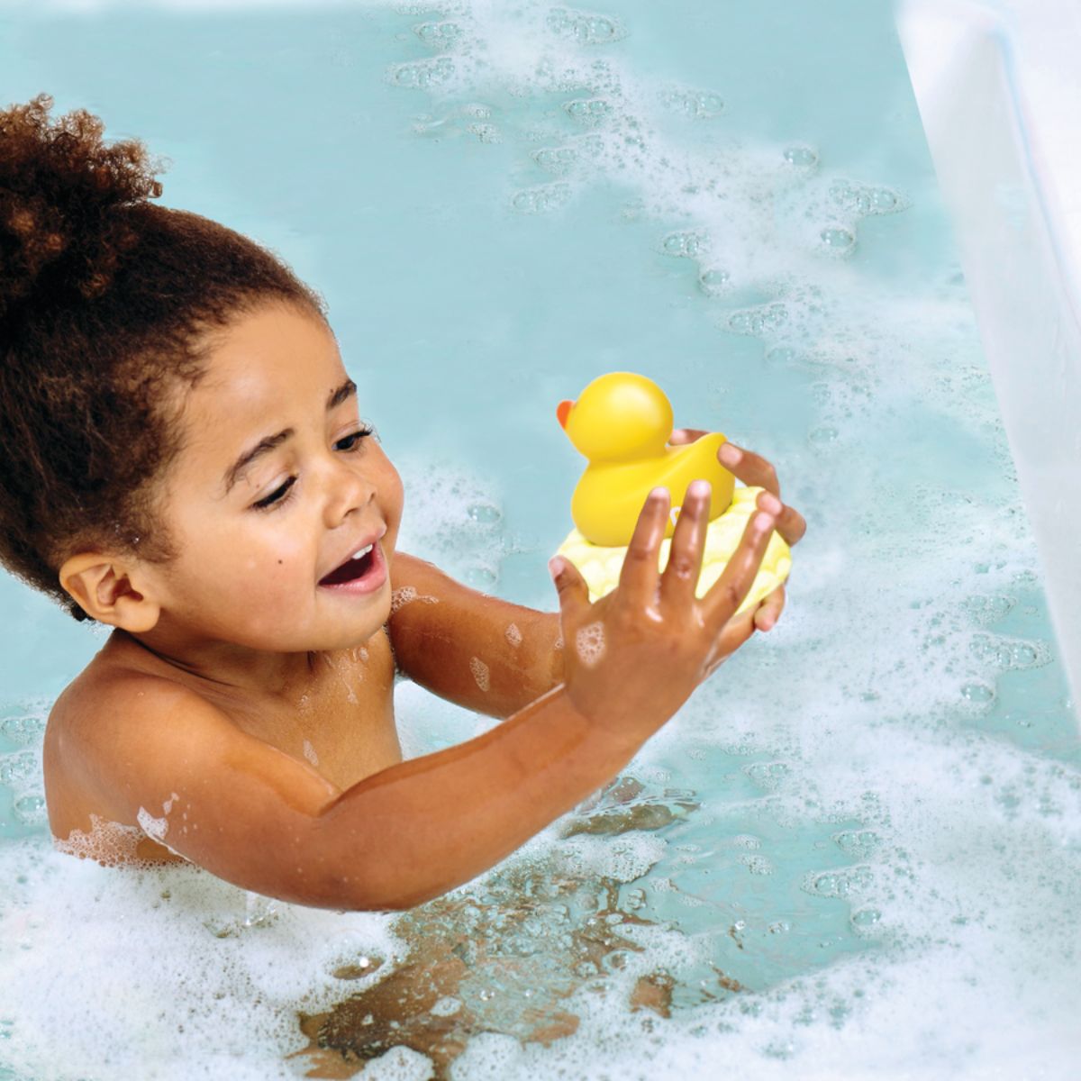 Munchkin Squeeze & Scrub Baby Bath Silicone Brush with Soap Dispenser on Luna Baby Store Miami