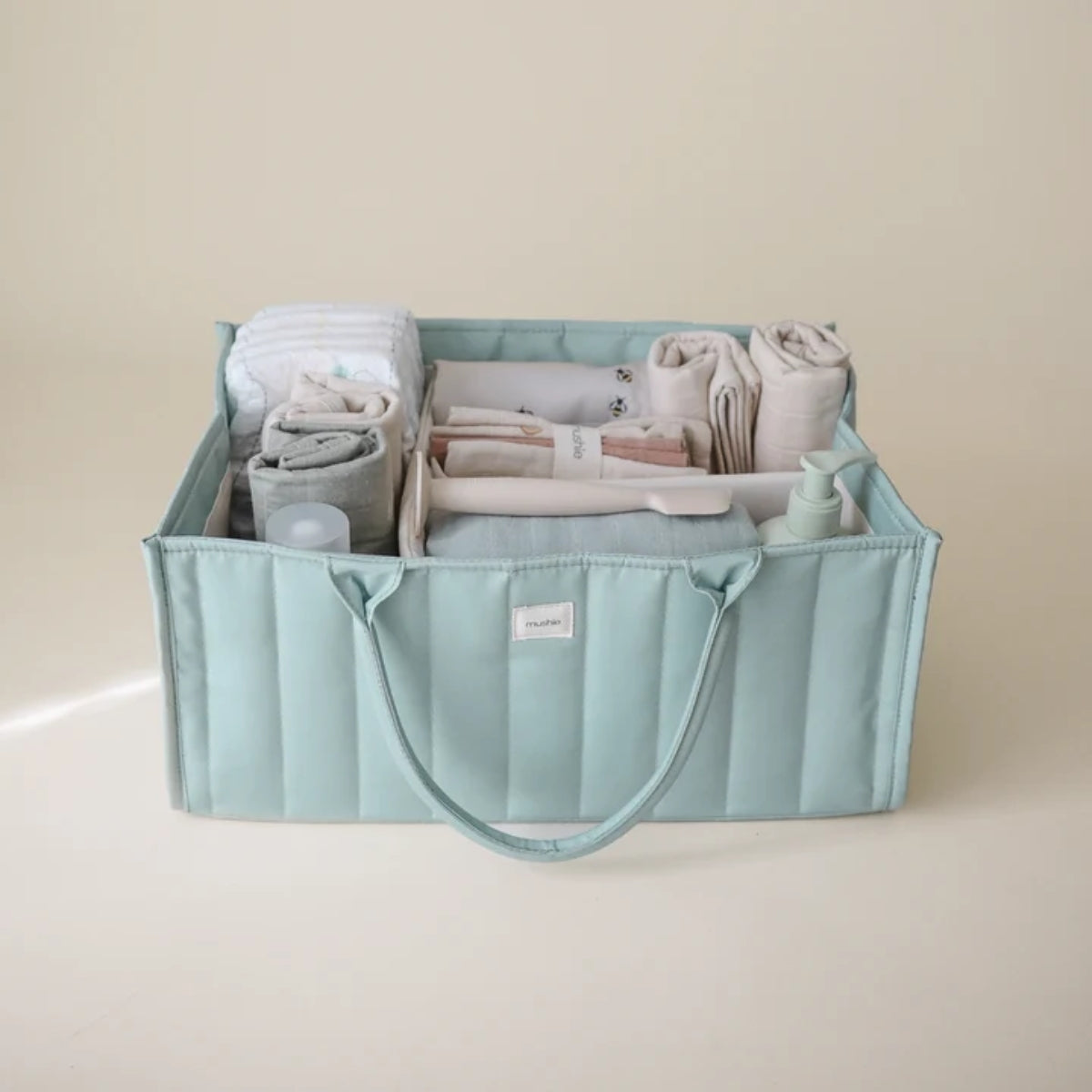 Mushie Diaper Caddy - Roman Green on Luna Baby Store Miami