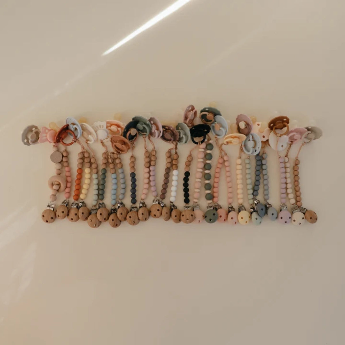 Mushie Silicone Pacifier Clip | Eva Powder on Luna Baby Store Miami