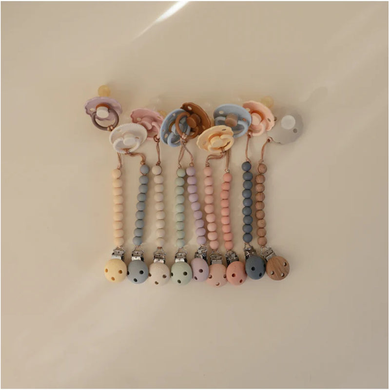 Mushie Silicone Pacifier Clip | Hera Shifting Sands