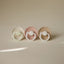Mushie FRIGG Daisy Night Glow Natural Rubber Pacifier 2-Pack - Croissant/Cream - 6-18M on Luna Baby Store Miami