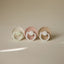 Mushie FRIGG Daisy Night Glow Natural Rubber Pacifier 2-Pack  - Croissant/Cream - 0-6M on Luna Baby Store Miami