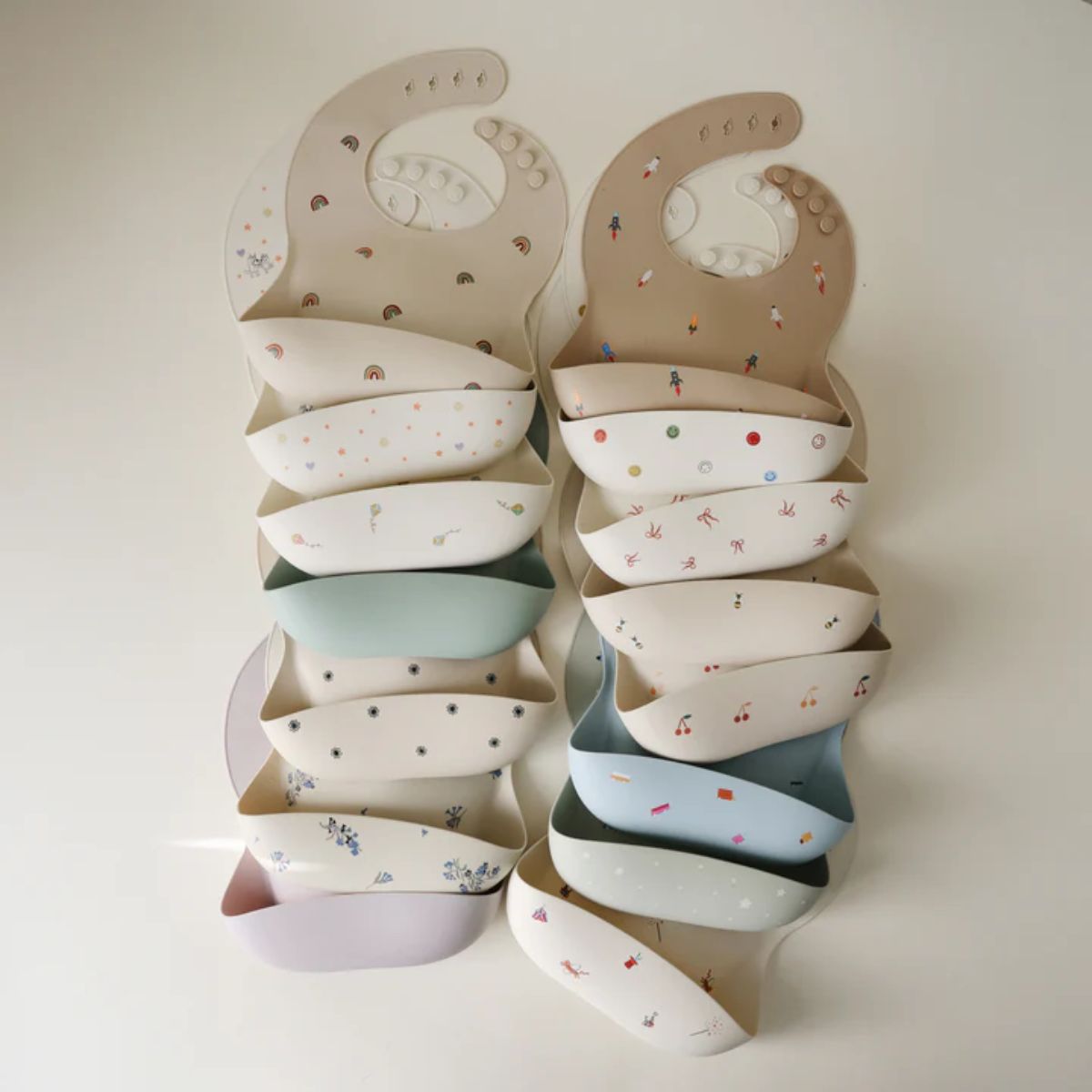 Mushie Silicone Baby Bib - Pink Flowers on Luna Baby Store Miami