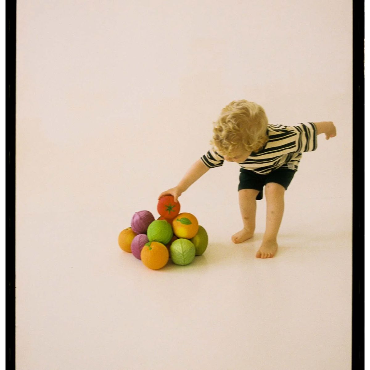Oli+Carol Sensorial Ball Baby Teether & Bath Toy Natural Rubber - Tomato Cabbage on Luna Baby Store Miami