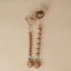 Mushie Silicone Pacifier Clip | Hera Faux Wood