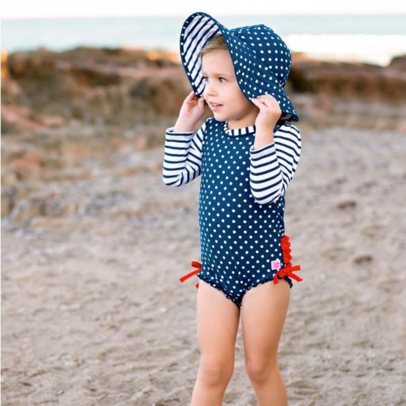 Ruffle Butts Swim Hat Navy Polka Dot Reversible